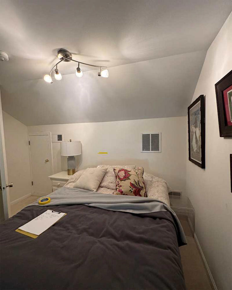 A plain attic bedroom is now a little jewel box after a colorful redo