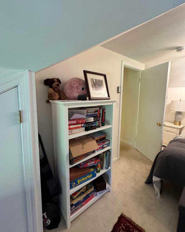 A plain attic bedroom is now a little jewel box after a colorful redo