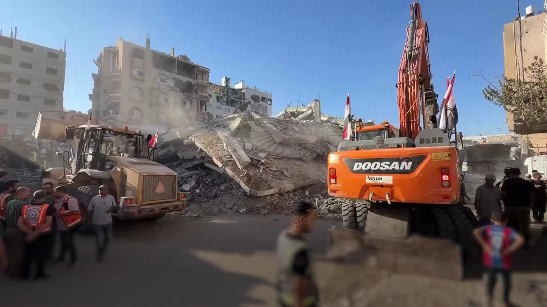 Children among at least 19 killed as damaged building collapses in Gaza ...