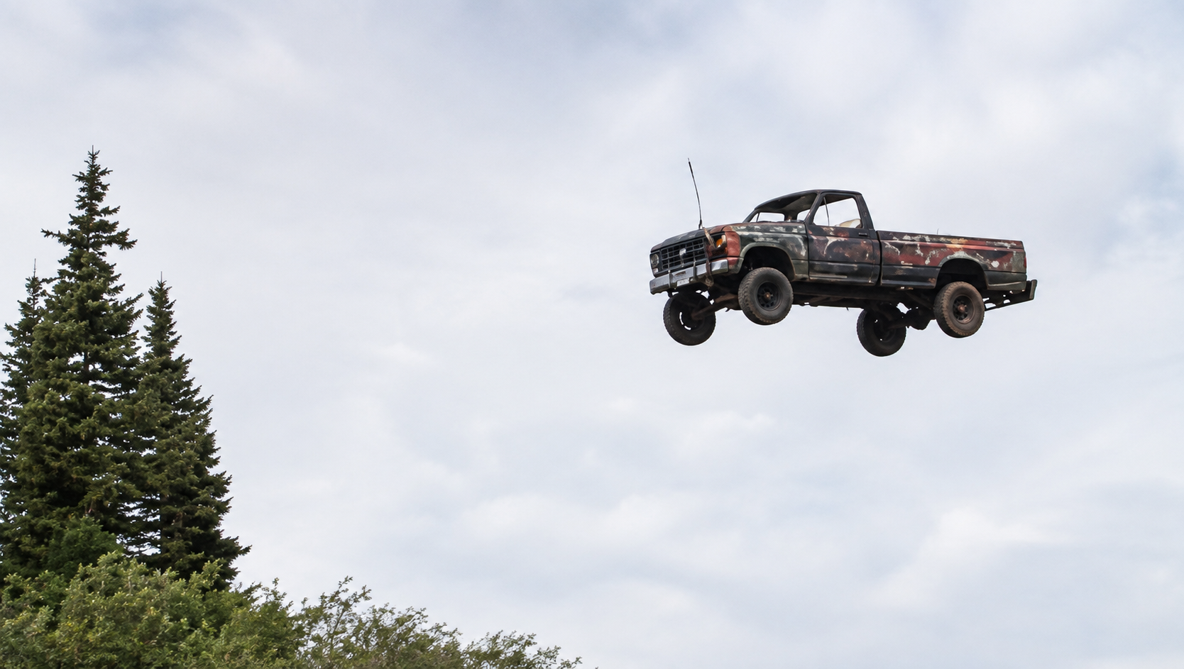 They launch their cars off a cliff - craziest car party on Earth