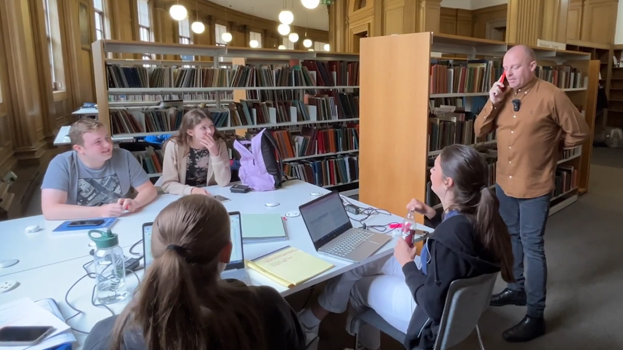 Impractical Jokers-style library prank goes awkward