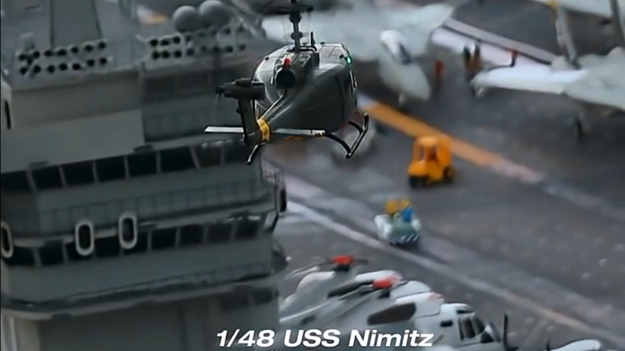 RC helicopter landing on a giant aircraft carrier model
