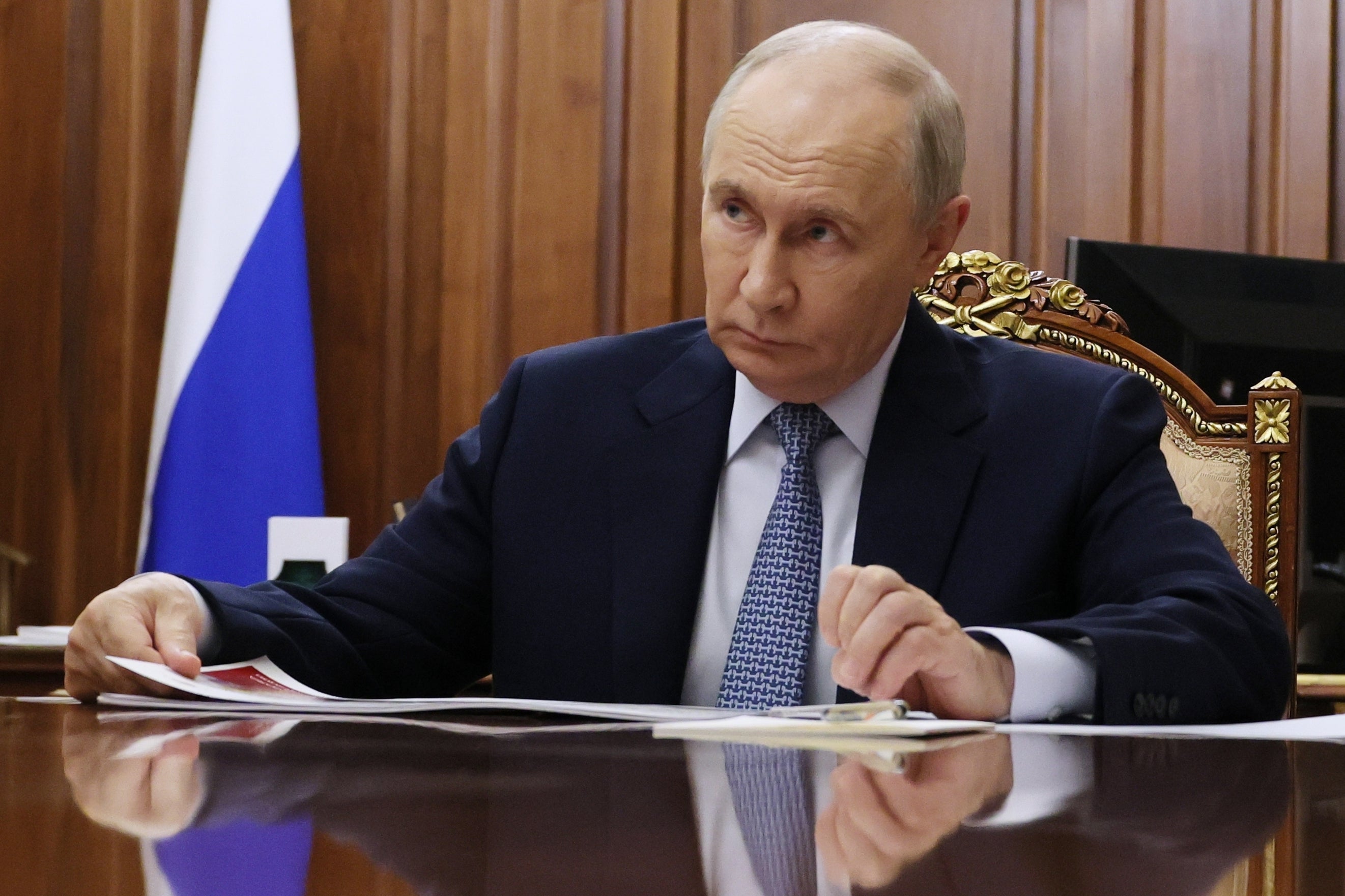 Russian president Vladimir Putin has been accused of launching hybrid attacks across the continent (AP)