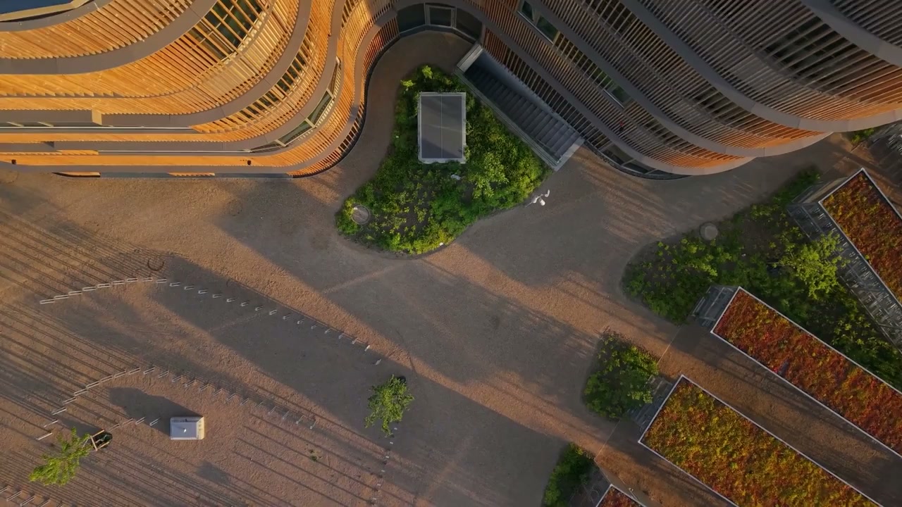WoodHub, Denmark: Drone views of modern wooden architecture and green ...