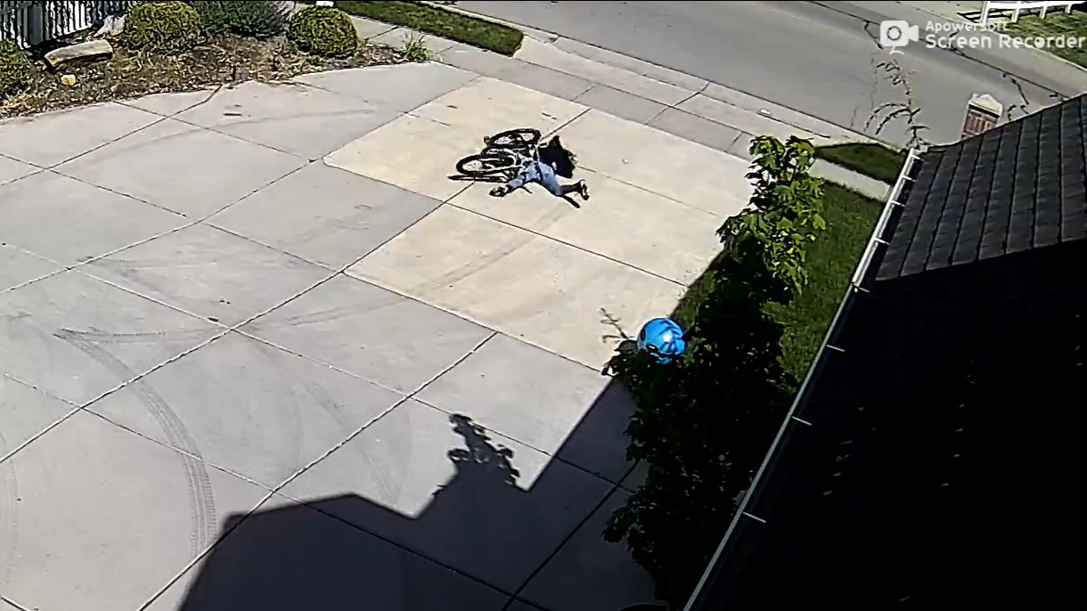 Watch two girls take bikes from an open garage then instant karma hits