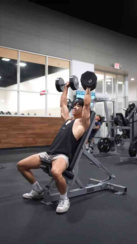 Seated dumbbell shoulder press form explained