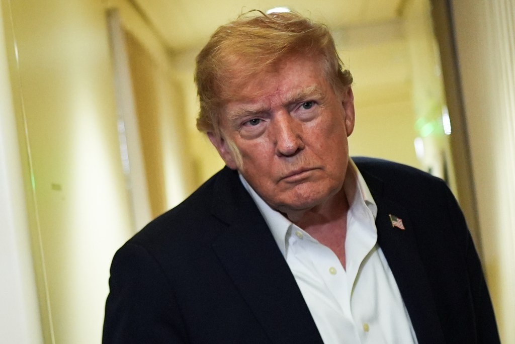 Trump defends Fed chair Kevin Warsh after interest rate hike, blames ...