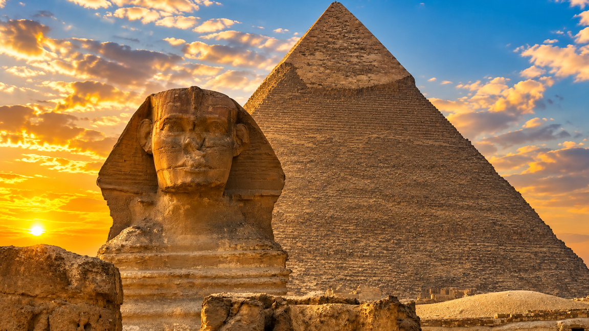 The Great Sphinx stands beneath Egypt’s ancient pyramid