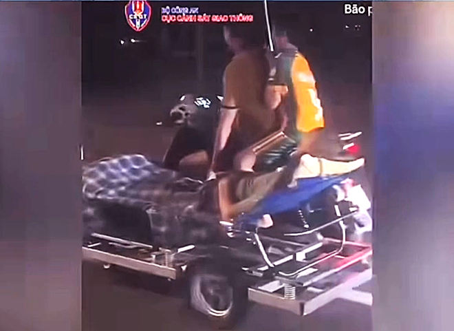 Kéo giường lưu động chở bệnh nhân đi bão, người đàn ông bị công an xử phạt
