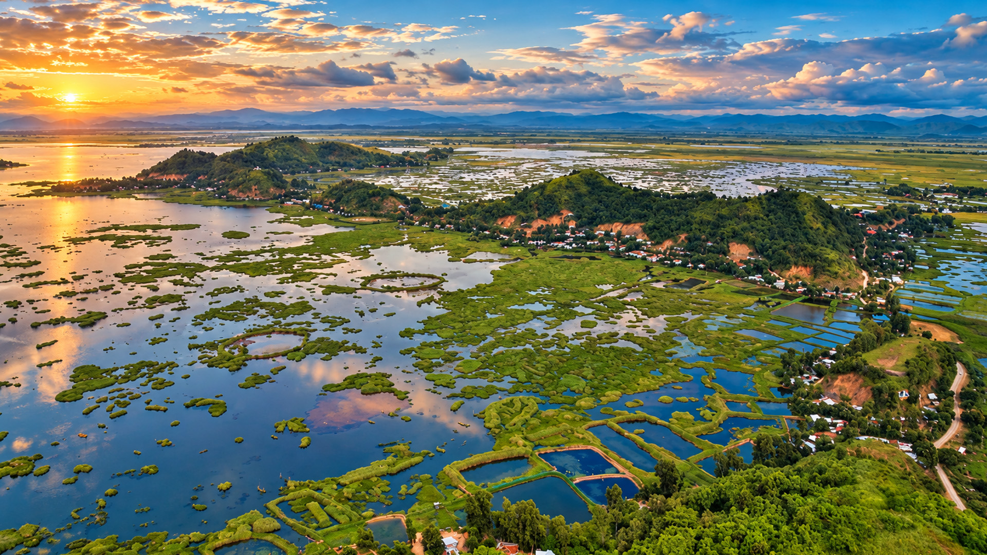 Floating Green Islands Scattered Across Loktak Lake