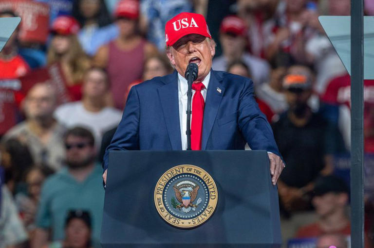 Trump tells female protester to 'go home to mama' during heated North ...