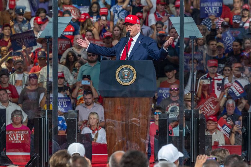 Trump tells female protester to 'go home to mama' during heated North ...