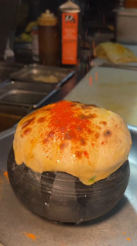 Chicken tikka biryani clay pot at Spice Symphony