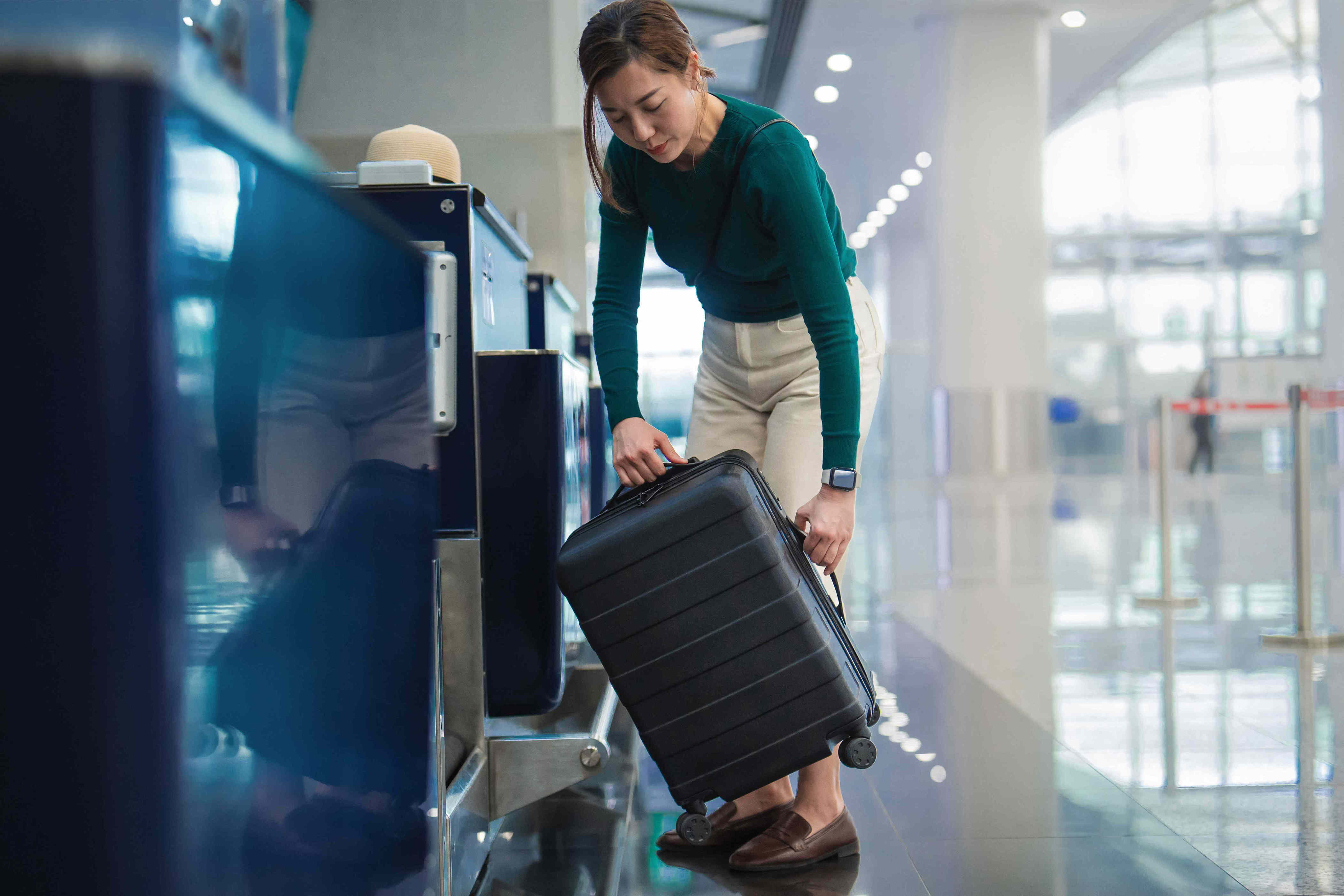 Frequent fliers swear by this $8 simple airport hack to make bag check easier—and now I do it before every trip