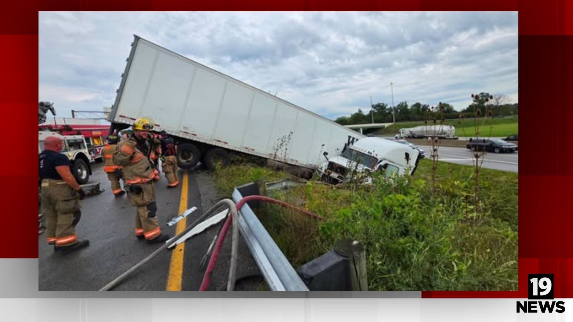 Akron Fire Hazmat team responds to semi-truck crash, fuel leak