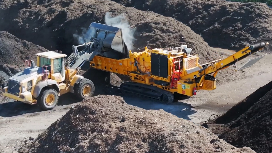 Giant industrial grinder makes short work of wood debris