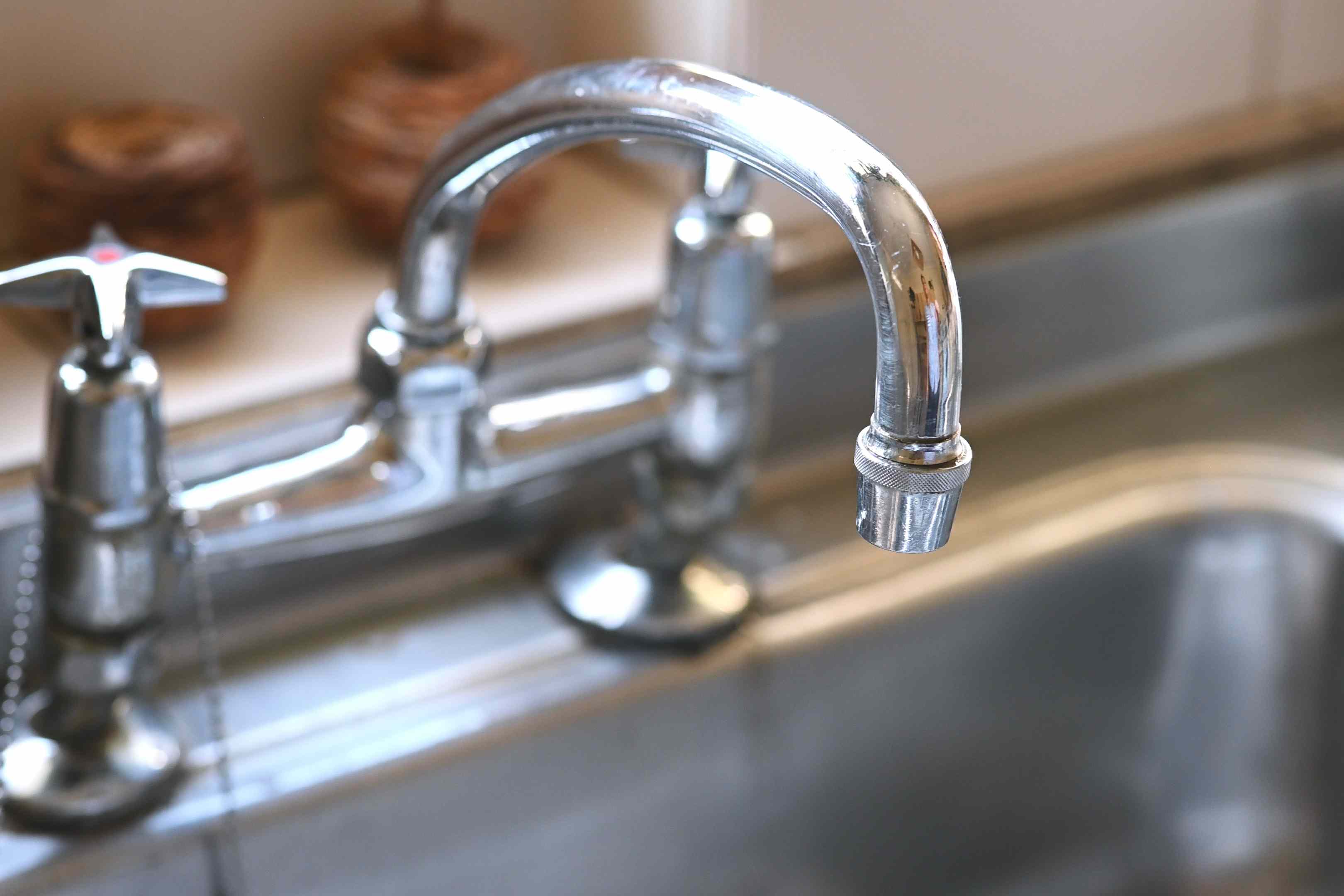 Why experts recommend cleaning faucets with vinegar—and how to do it