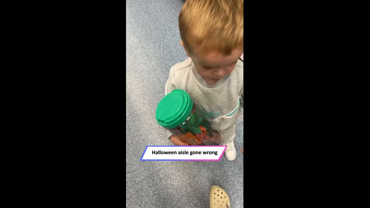Parent utilizes a spooky prop hand to frighten young child