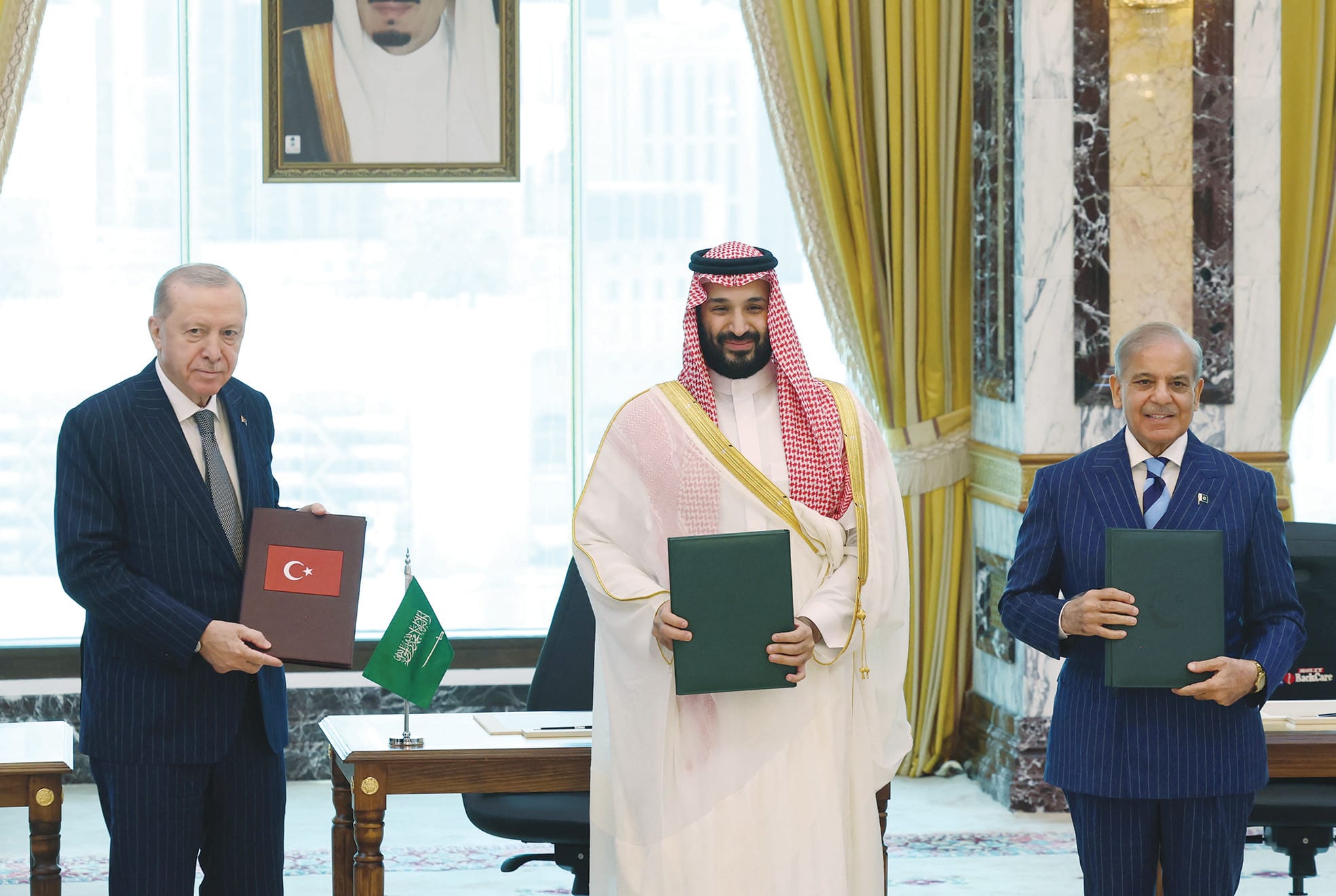 What does the text of Pakistan-Saudi Arabia-Turkey defense pact say?