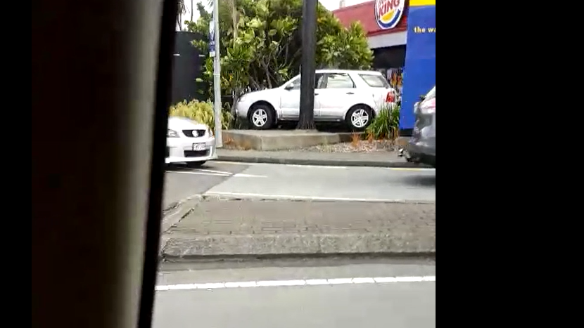 Watch the moment a Burger King drive-thru run ends in a bizarre crash