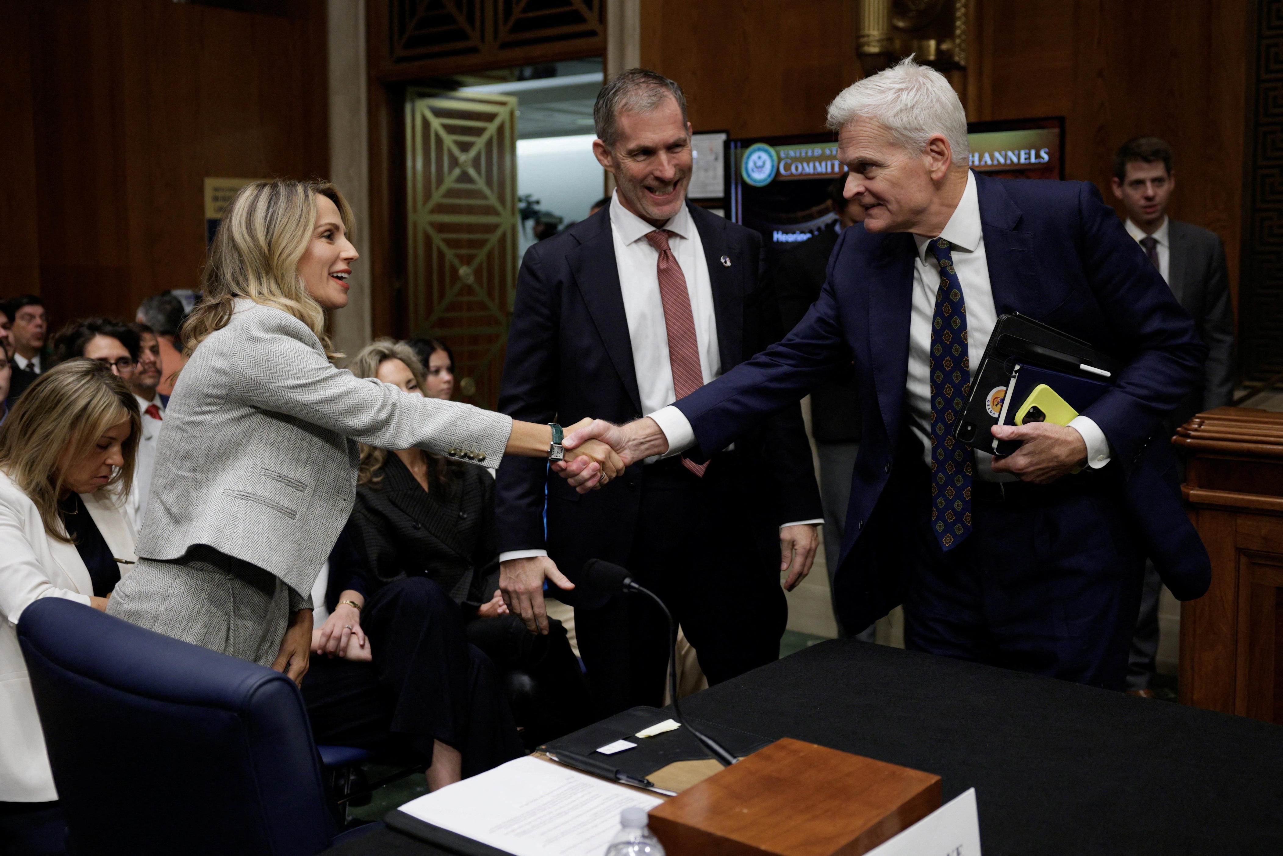 U.S. Surgeon General nominee Dr. Nicole Saphier shakes hands with the Chairman of the Senate Health Education, Labor and Pensions Committee U.S. Senator Bill Cassidy.