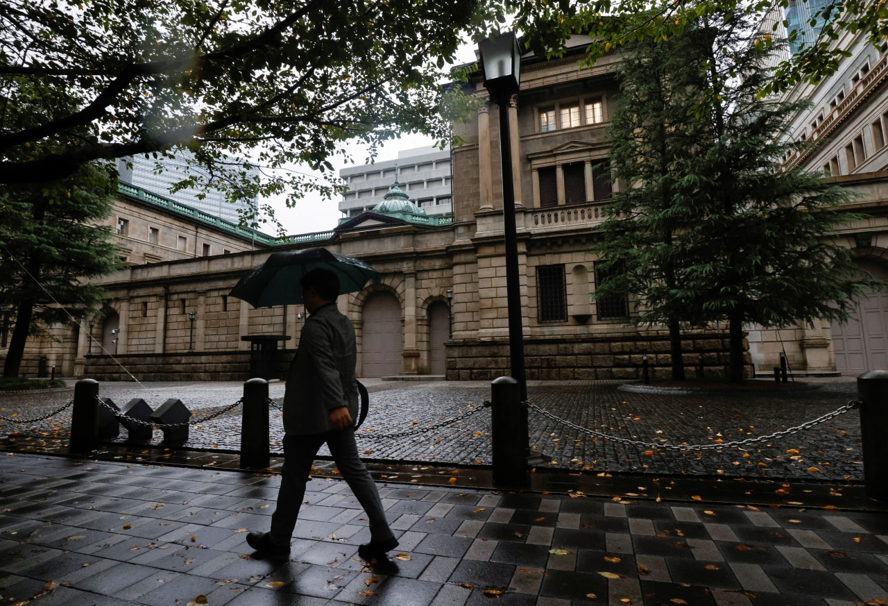 Japan's central bank picks up pace of tightening with rate hike