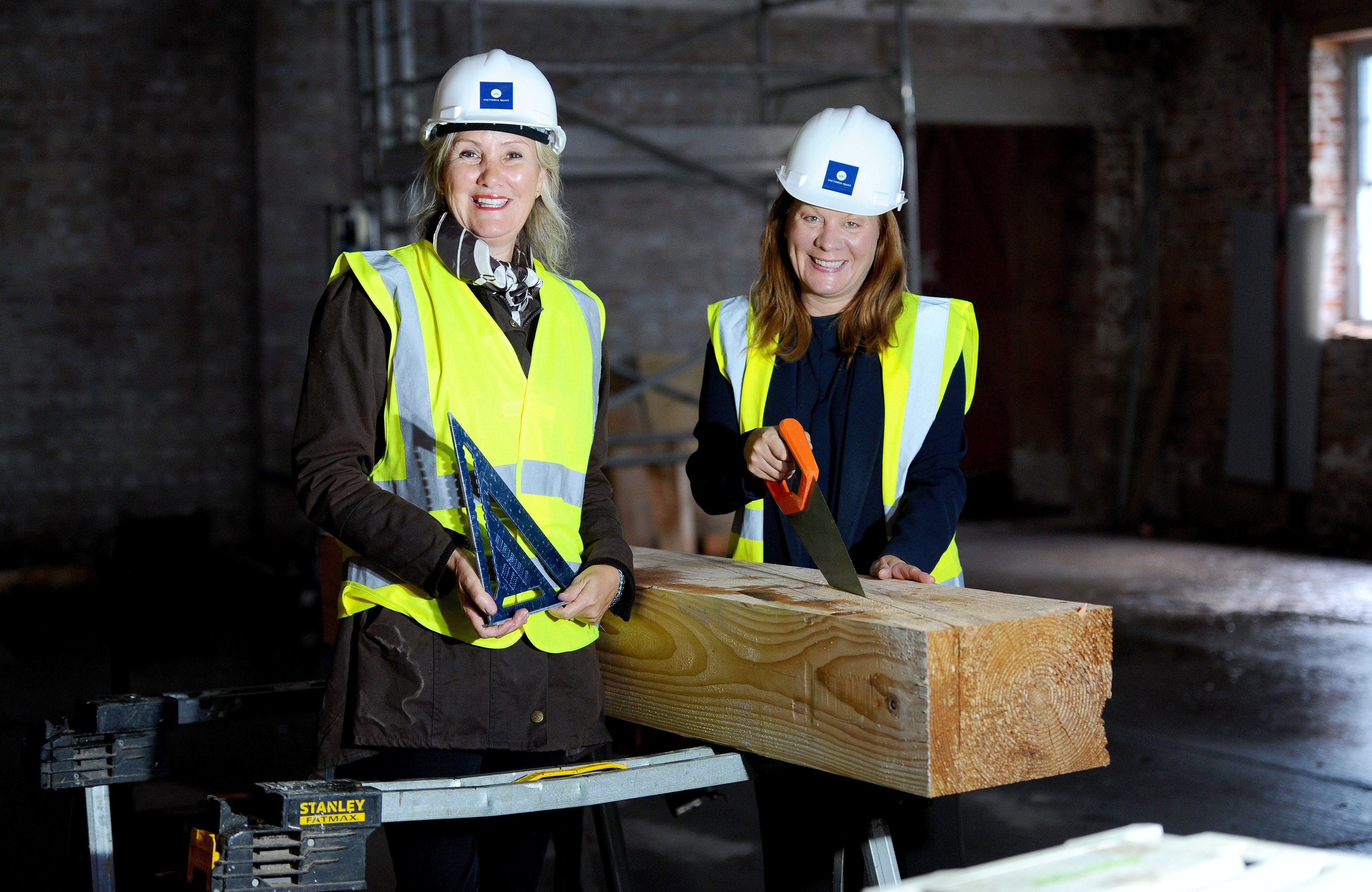 From L: Caroline Dinenage, MP for Gosport, and Councillor Zoe Huggins, leader of Gosport Borough Council, trying their hand at woodwork at the Royal Navy Rum Store.