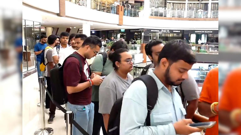 First day matters: iPhone lovers queue up across India