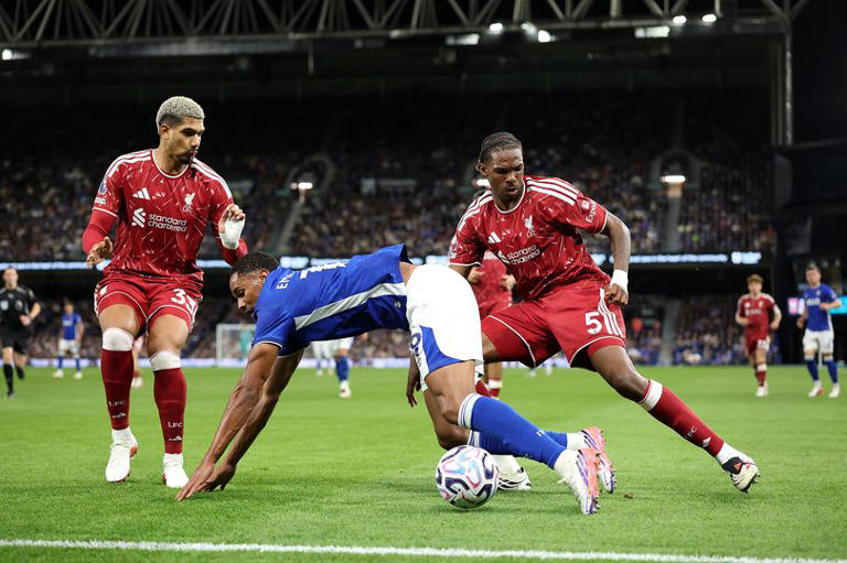 Emersonn of Ipswich Town is put under pressure from Ronald Araujo and Jeremy Jacquet of Liverpool during the Premier League 2026/27 match between Ipswich Town and Liverpool FC at Portman Road on September 04, 2026 in Ipswich, England.