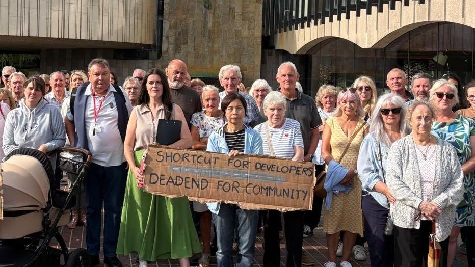 Public debate to be held over housing controversy