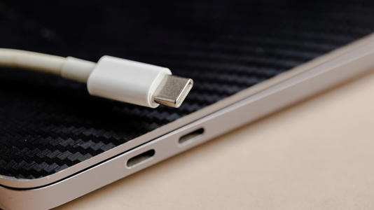 Why Do Laptop Chargers Have A Box In The Middle Of The Cable?
