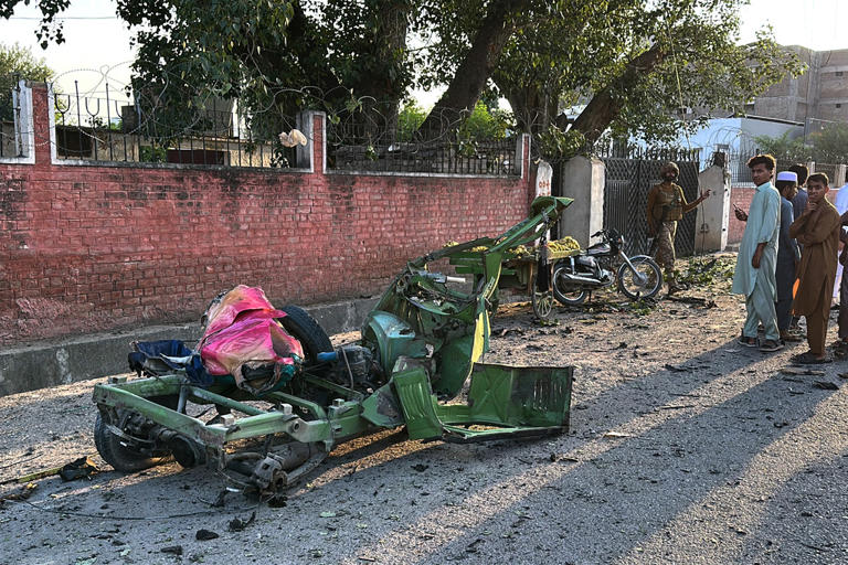 Bombing at mosque near police offices in Pakistan kills at least 21