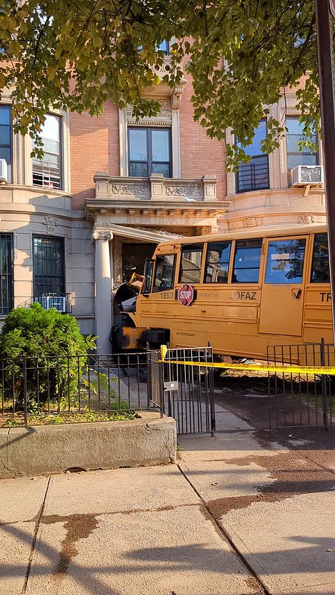 School bus crashes into Brooklyn building