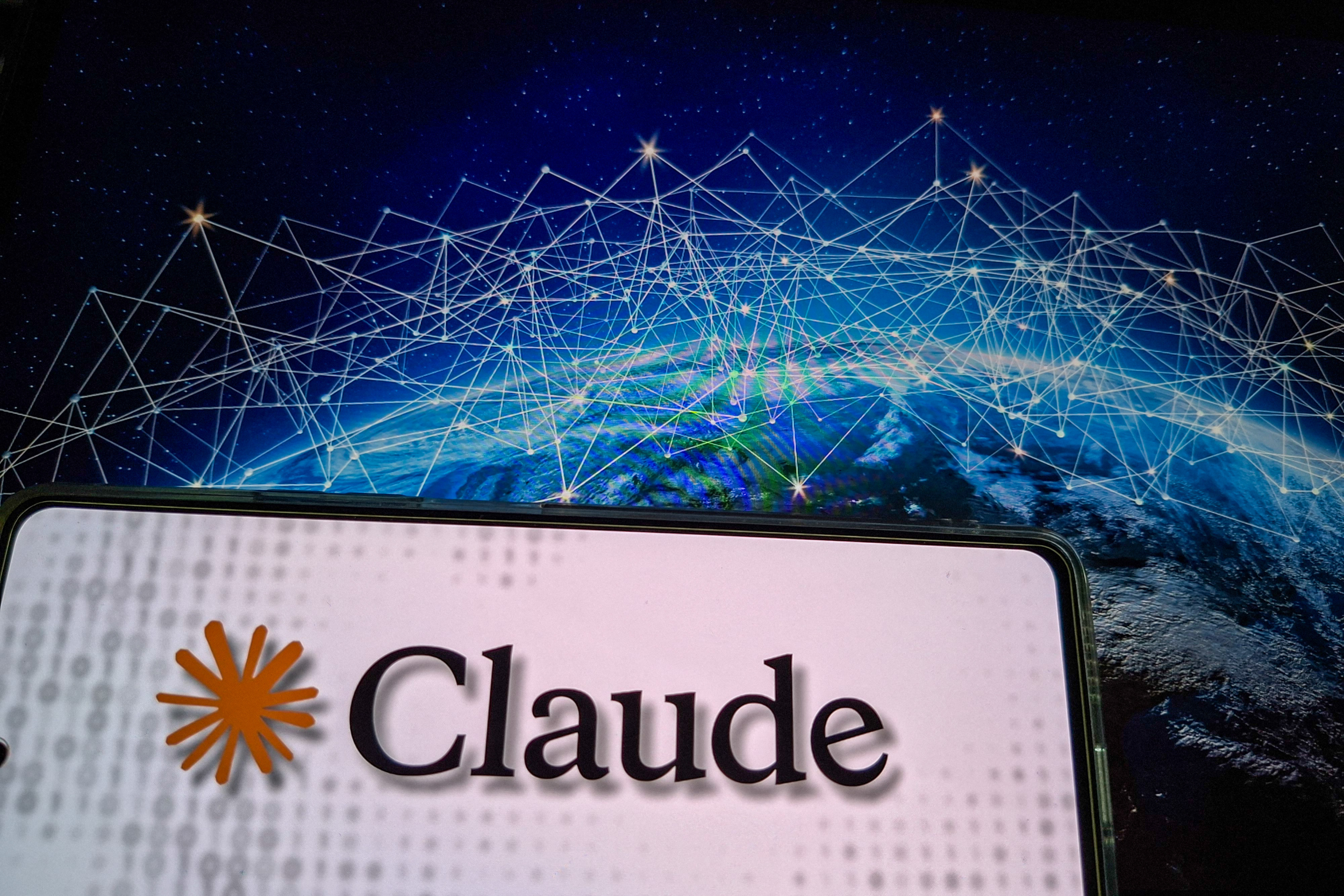 Claude is helping build its own successor. Anthropic says AI now leads ...