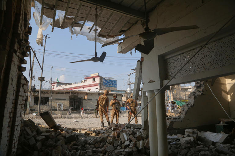 Bombing at mosque near police offices in Pakistan kills at least 21