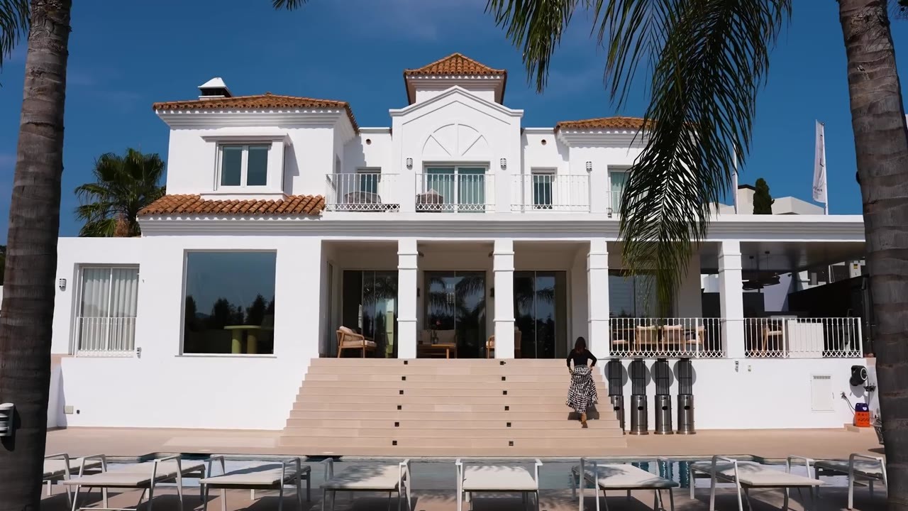 This luxury home has a 3.5-meter sofa and a table built for 12