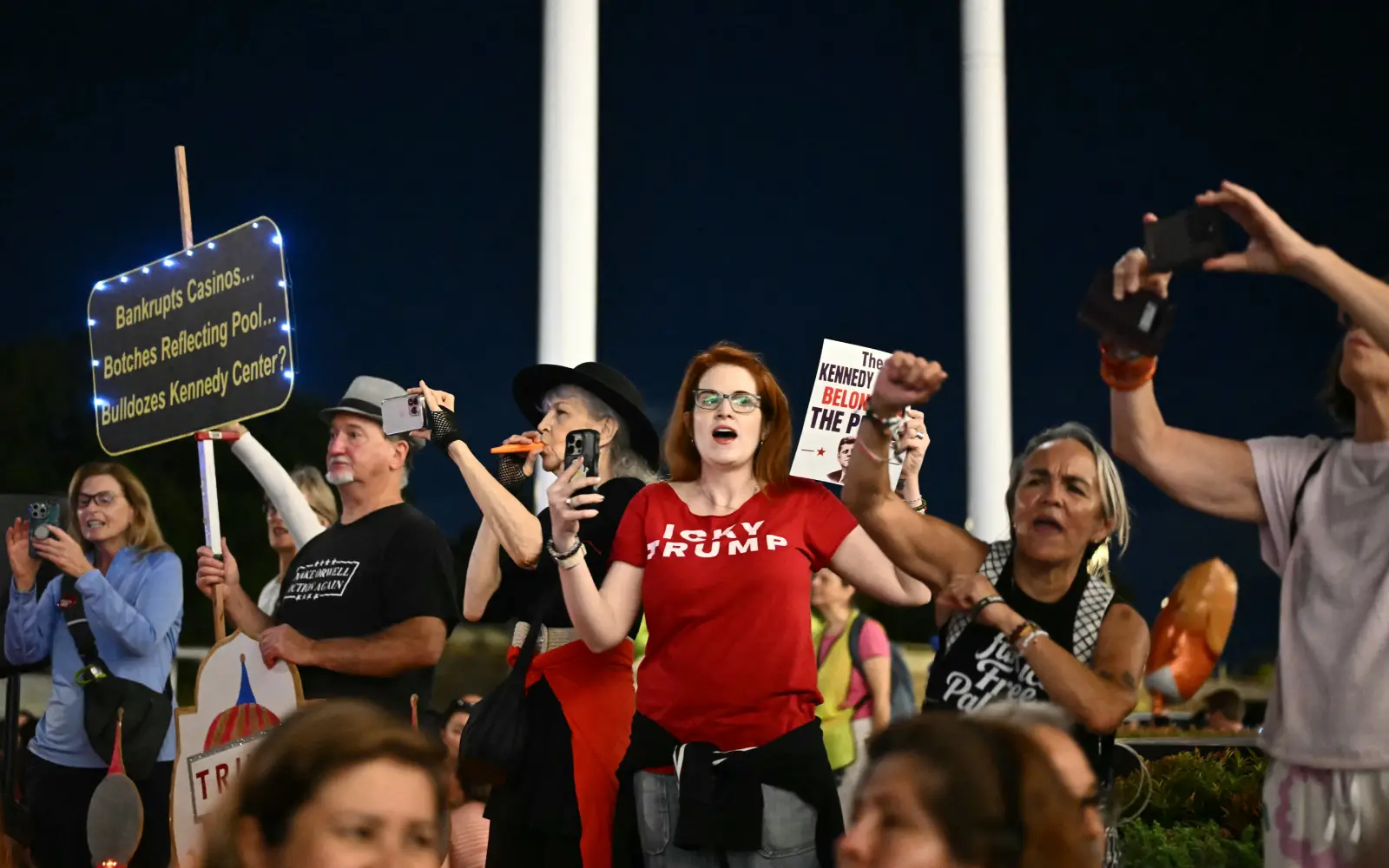 Protesters form human chain at Kennedy Center after Trump threat