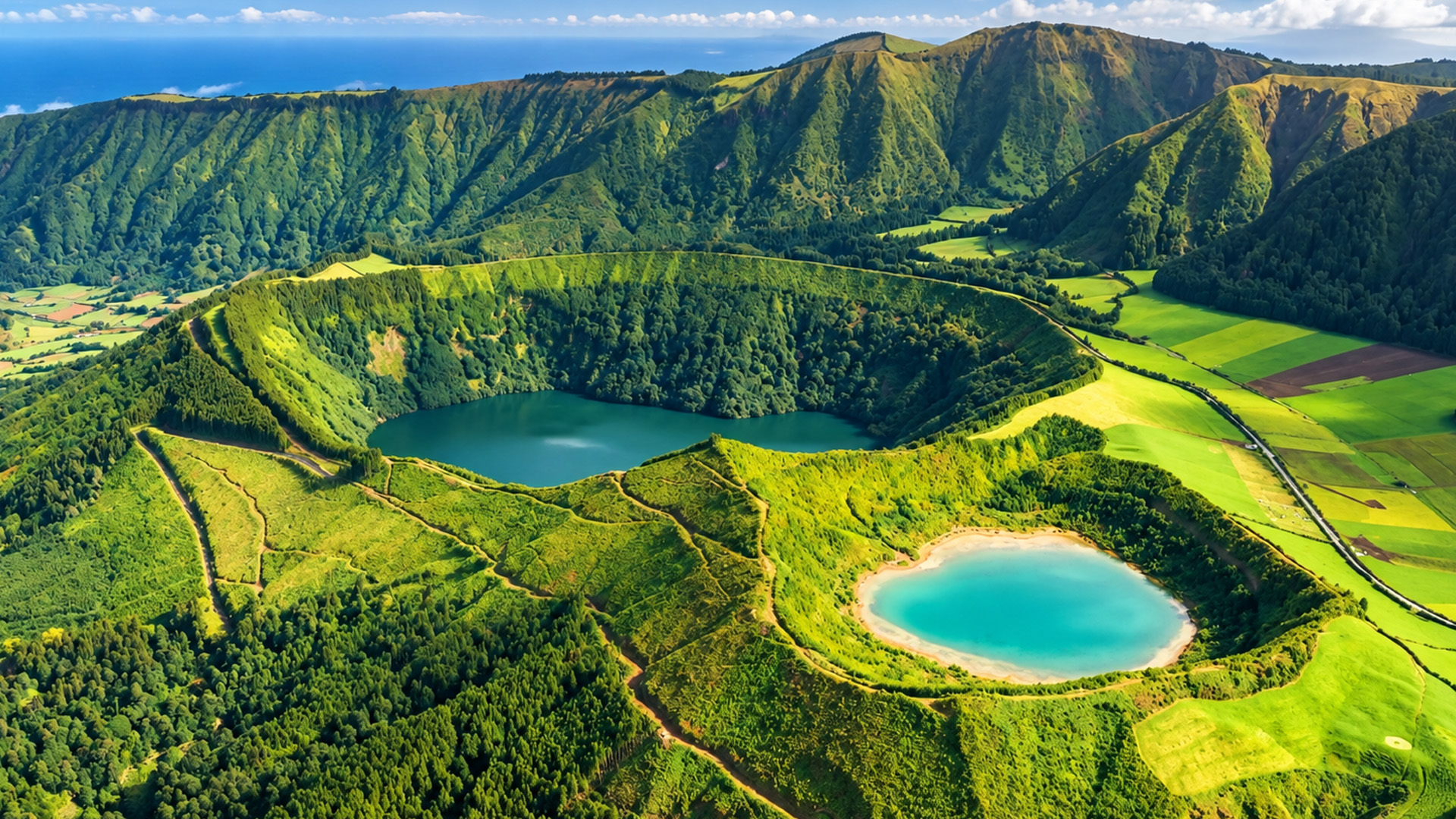 Twin lakes surrounded by steep volcanic ridges