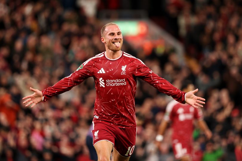 Alexis Mac Allister of Liverpool celebrates after scoring their team's first goal during the Carabao Cup Third Round match between Liverpool and Tottenham Hotspur