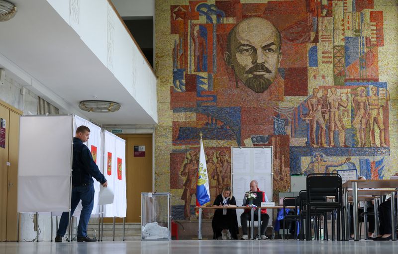 Russia reports online attacks on electoral system on second day of ...