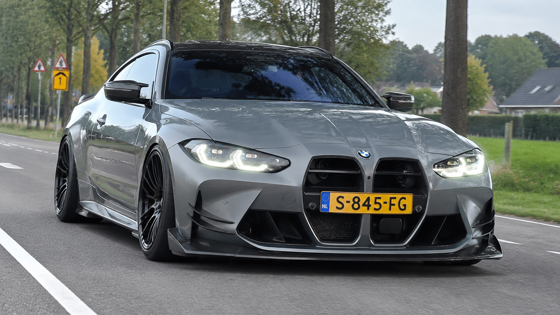 Modified BMW M4 shows a wider road stance