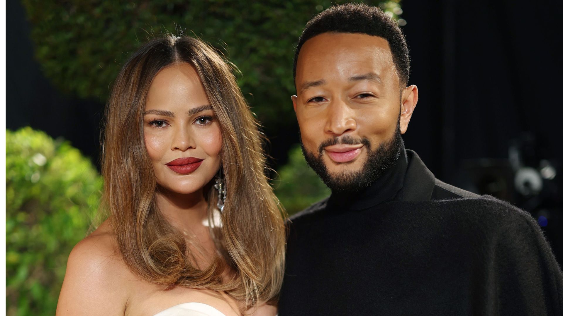 Chrissy Teigen's warm minimalist living room is a masterclass in ...