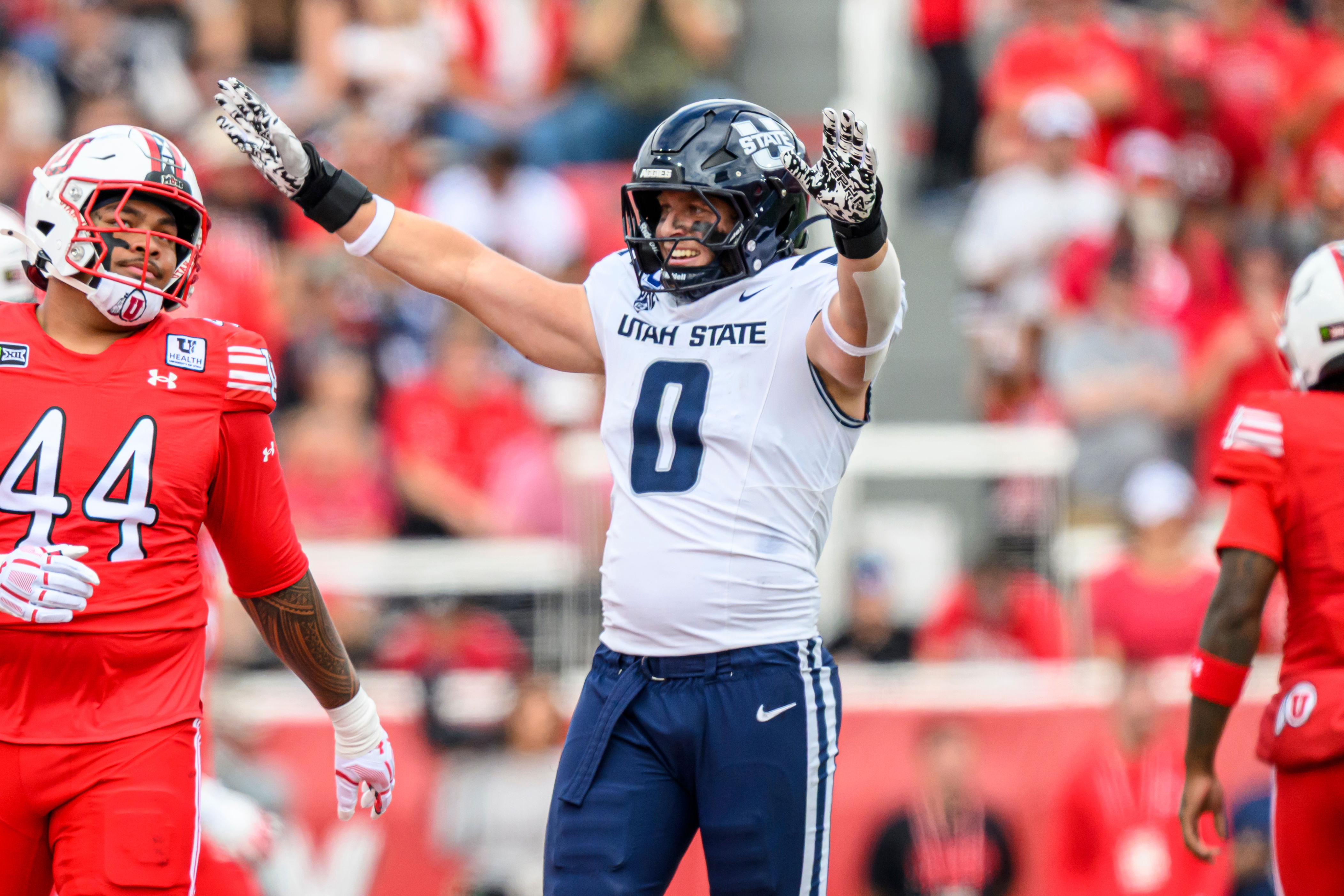 Utah State's Taggart leaves field in an ambulance; in concussion ...