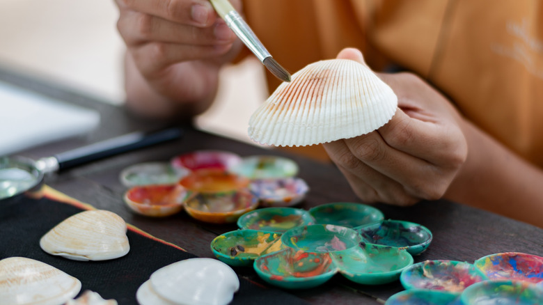 Use seashells to create budget-friendly coasters with a clever DIY