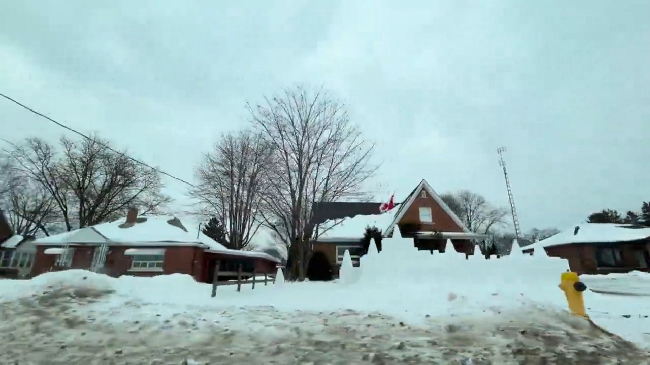 Retired man builds large snow castle in Toronto neighborhood