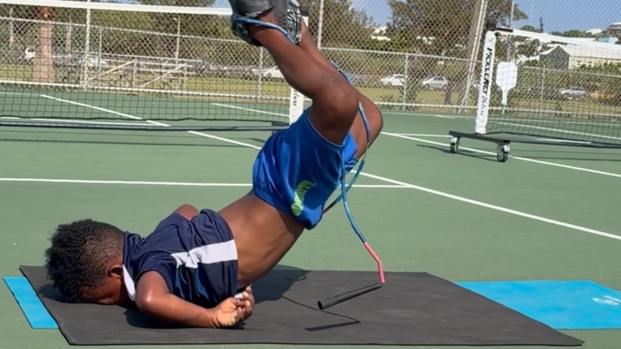 Boy faceplants while attempting jump rope handstand
