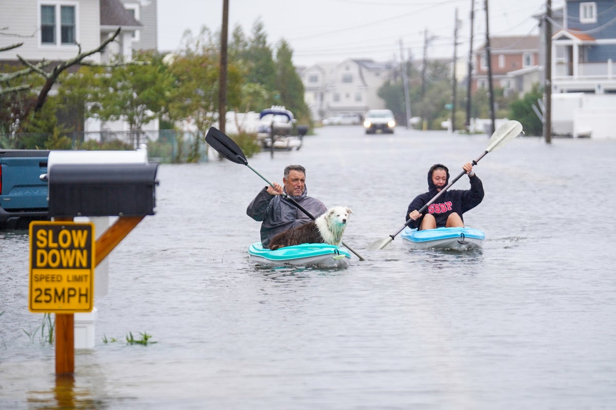Residents kayak on flooded roads as nor’easter brings torrential rain