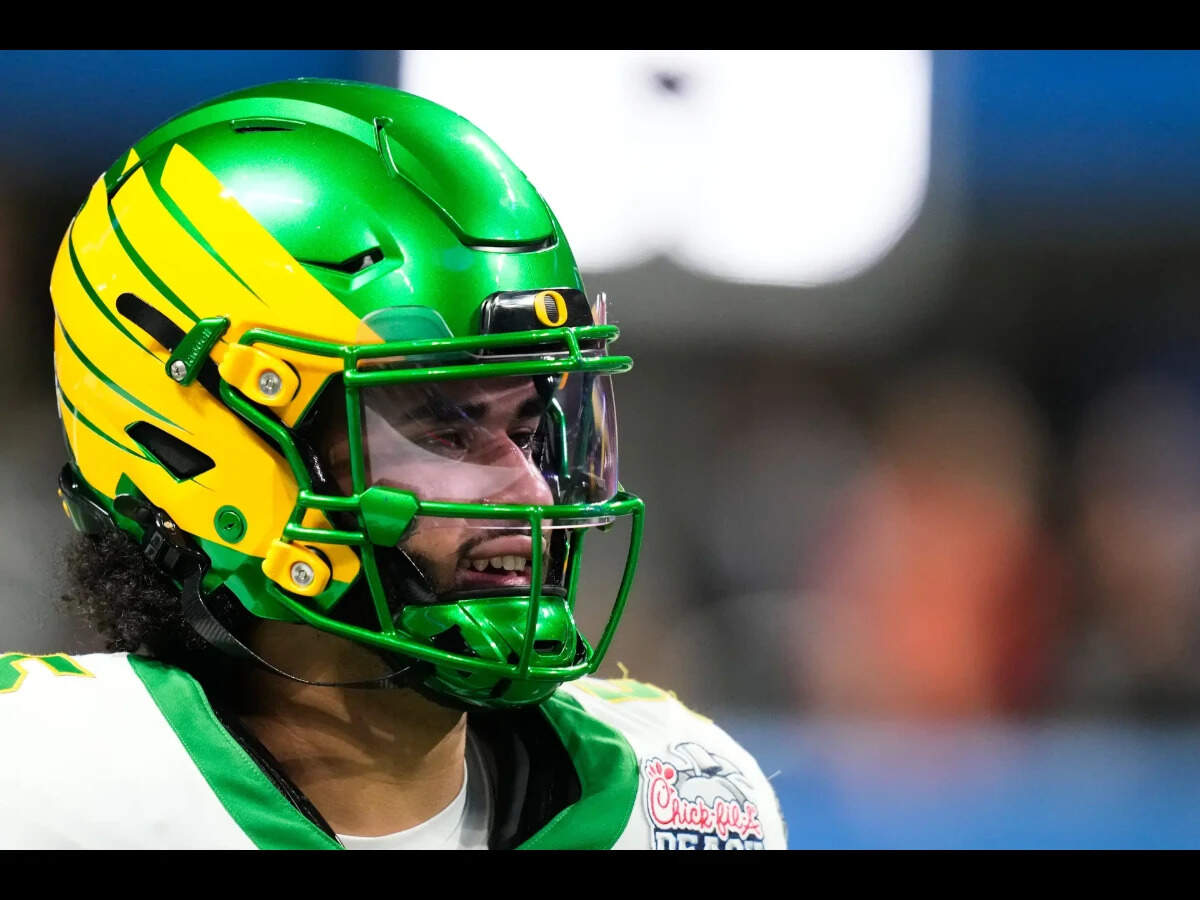 Image for Watch: Oregon QB Dante Moore’s head smashes hard onto turf after a late hit, carted off the field in a viral video; check injury update
