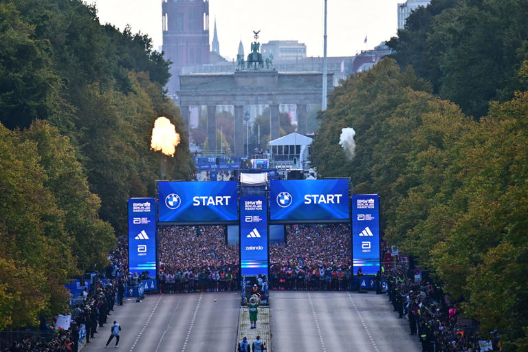 Adola wins men's Berlin Marathon, Assefa dramatically misses record