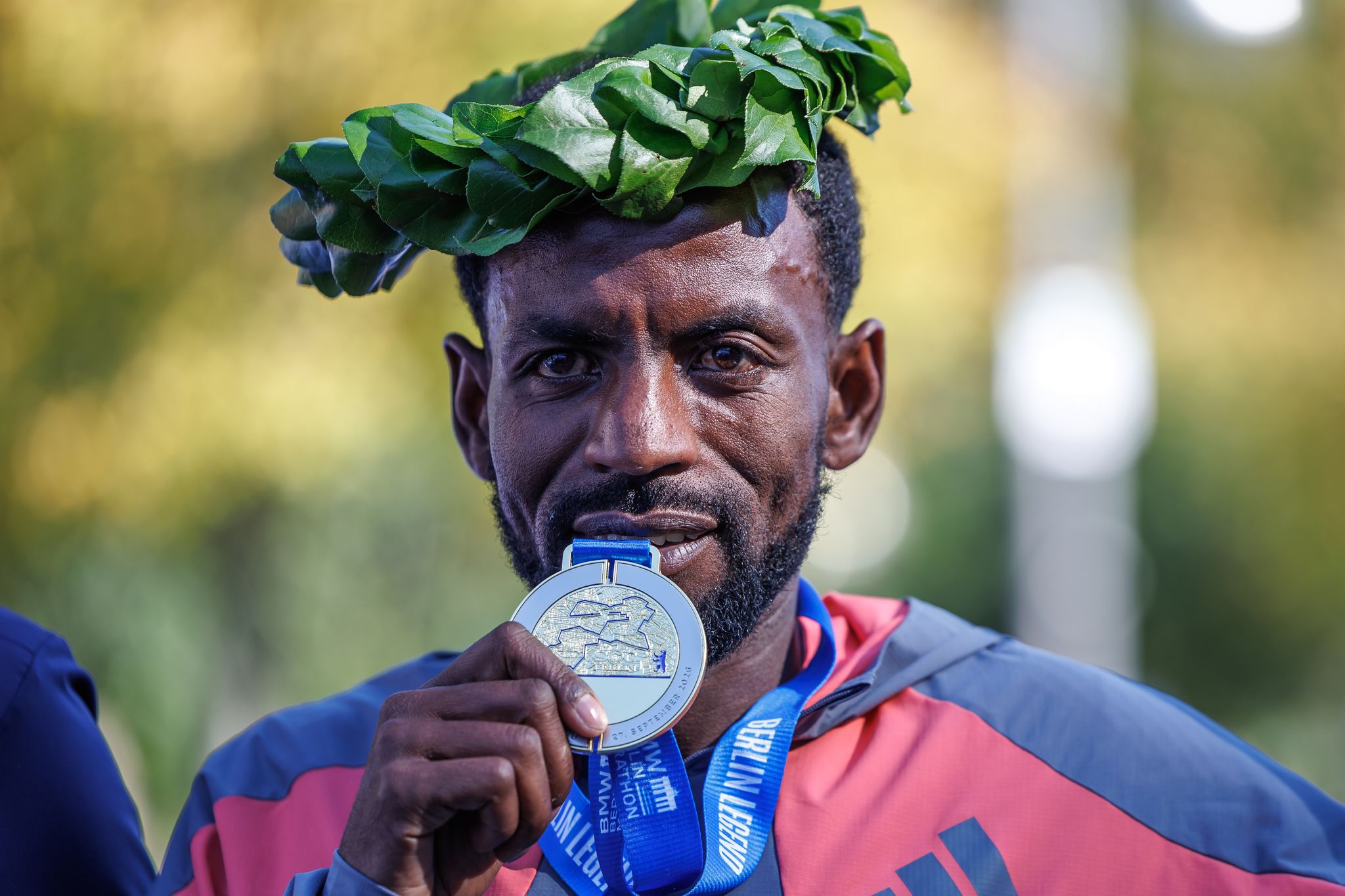 Adola wins men's Berlin Marathon, Assefa dramatically misses record